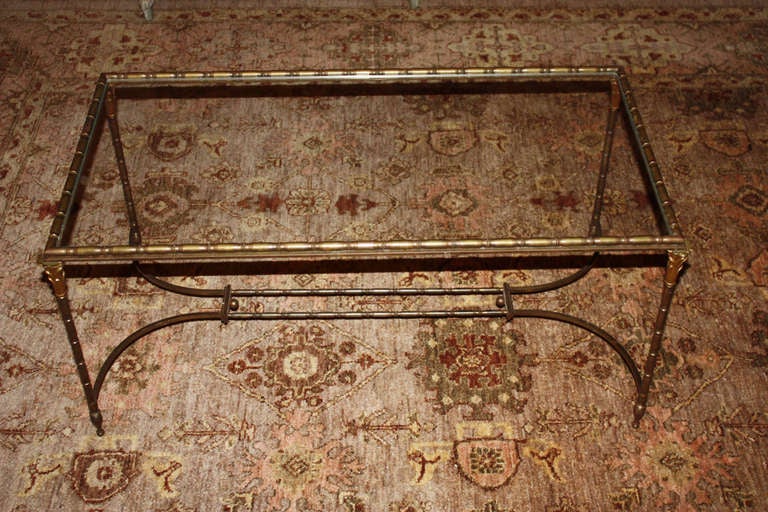 A fine brass framed faux bamboo coffee table by Maison Bagues circa 1950.