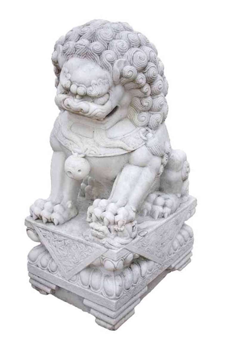 This is a pair of antique white marble Chinese Foo dogs. Also known as Chinese 