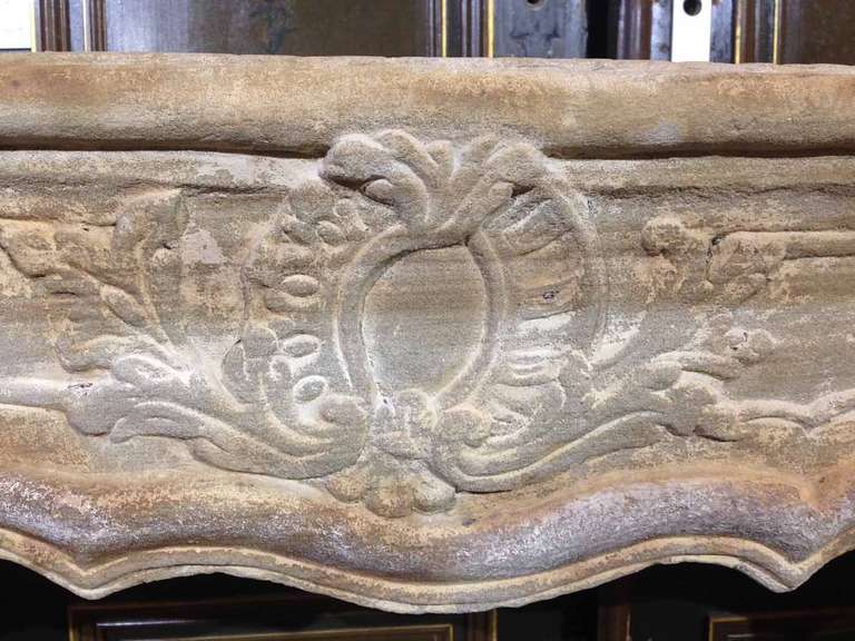 Beautiful French sandstone mantel with great patina.
Firebox: 36