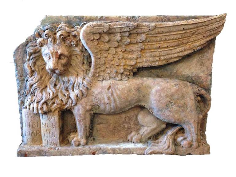 Antique Italian marble plaque featuring a winged lion.