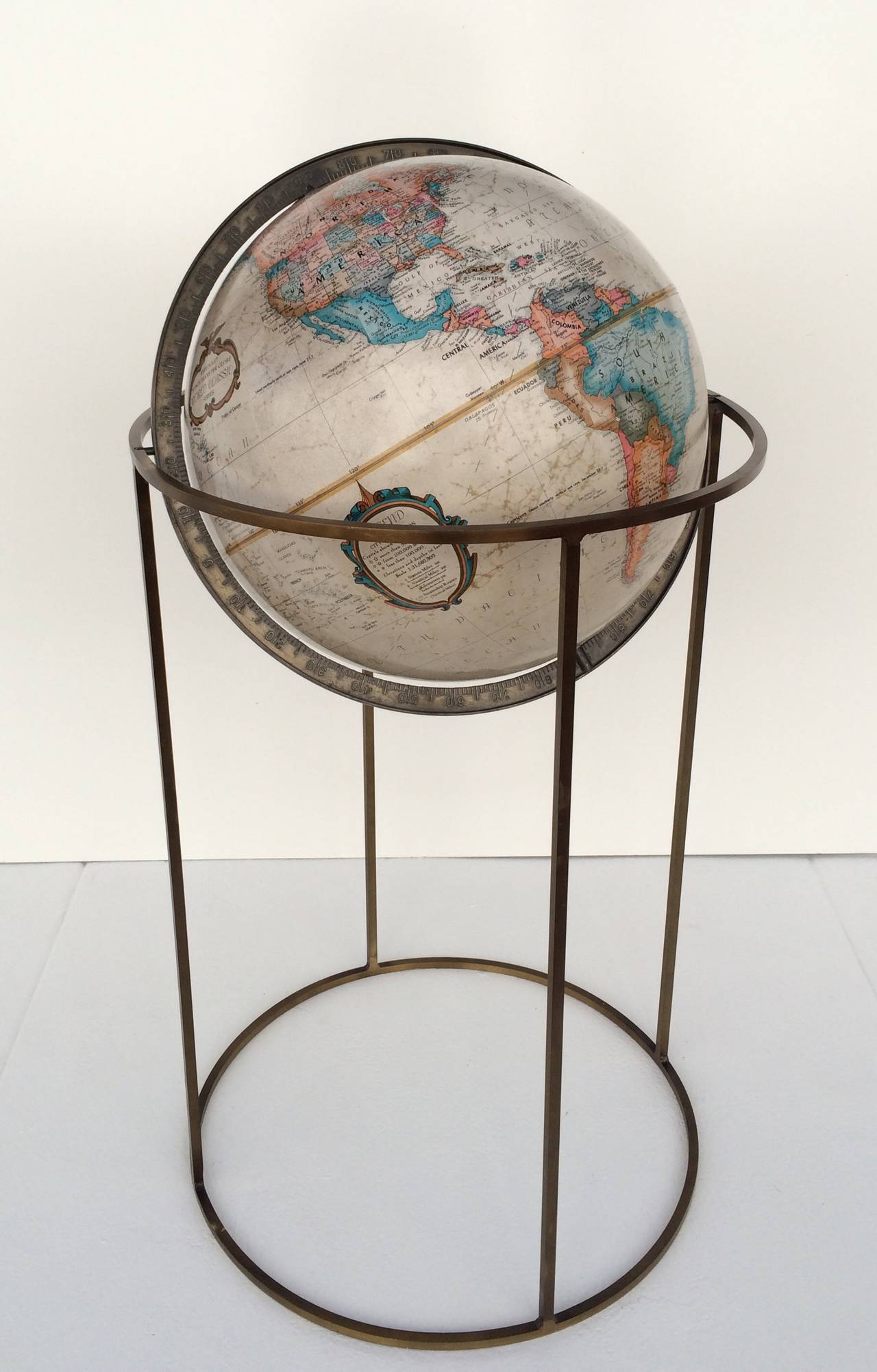 World globe on a bronze stand designed by Paul McCobb, 
circa 1960s.