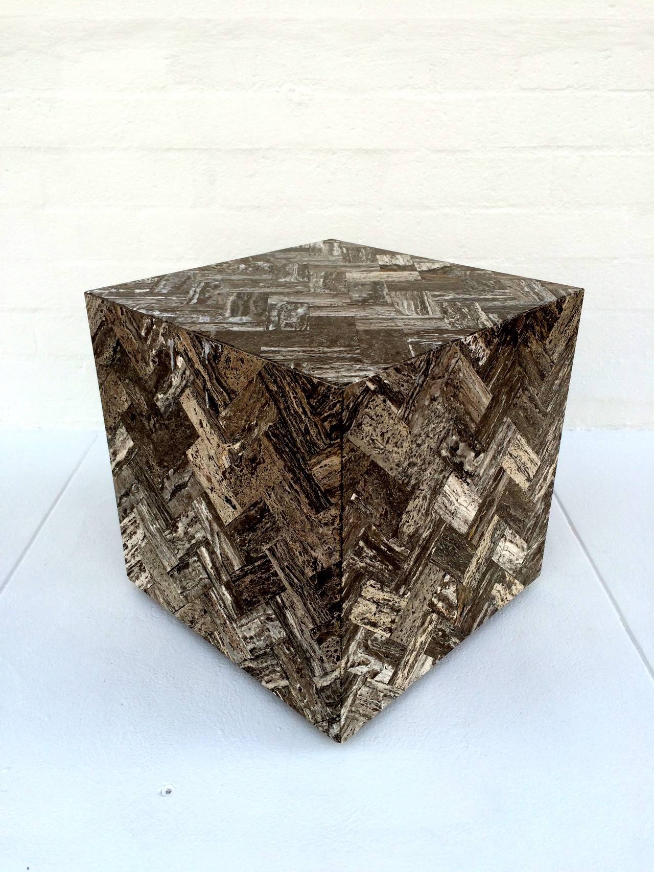 A gorgeous sealed travertine cube.
Has hidden wheels to make moving around easy.
The geo metric pattern makes for a wonderful eye pleasing addition to any space.
circa 1970s.
The cube is 18