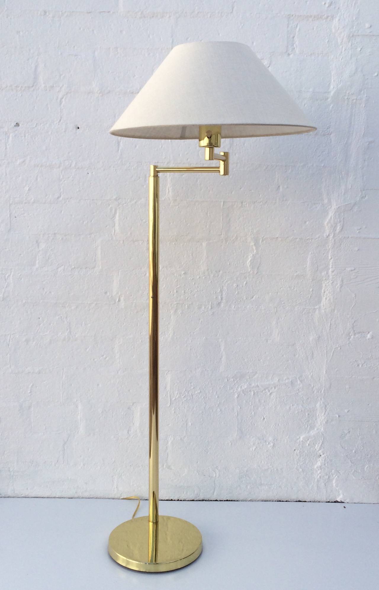 American Polished Brass Adjustable Floor Lamp by Walter Von Nessen