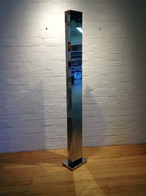 A tall chrome floor lamp for Cassella.
This lamp was designed with a dimmer to control the light output.