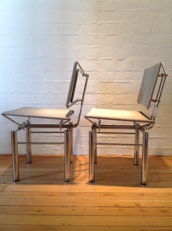 A pair of Chrome &  Stainless Steel Mesh  Chairs 1