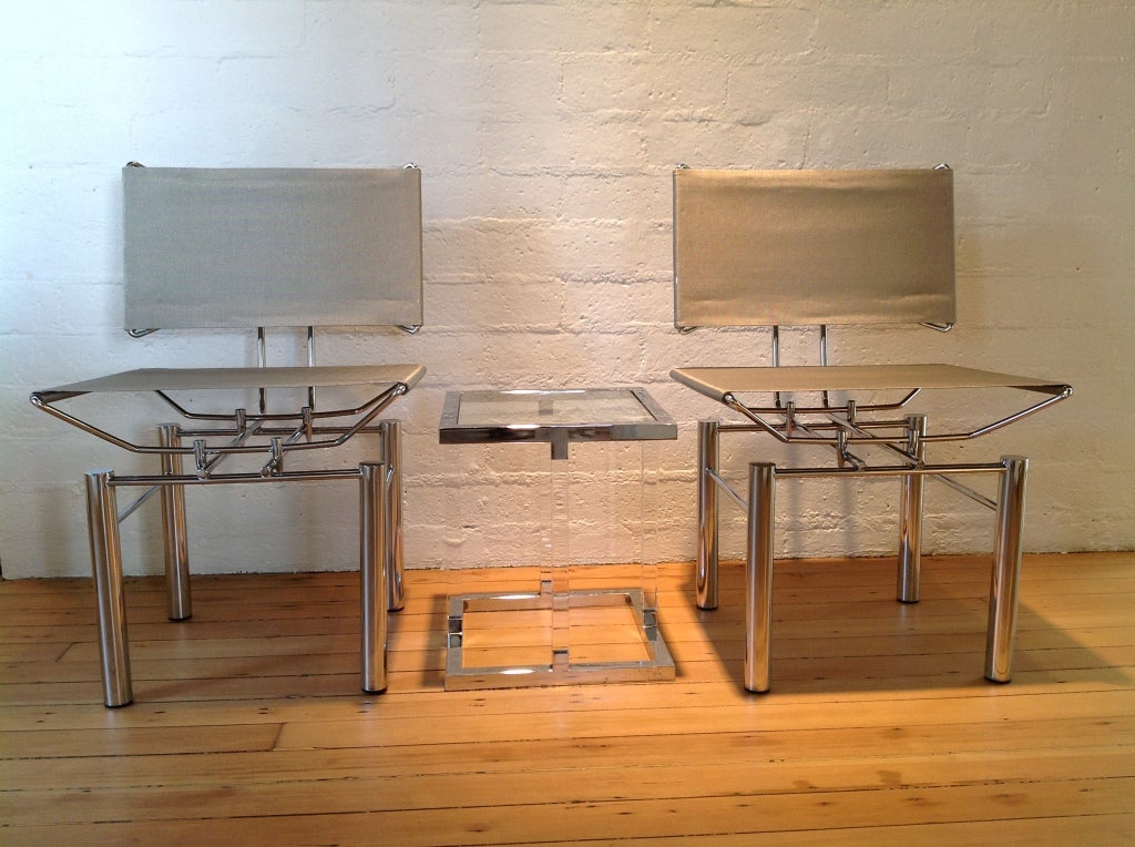 A pair of Chrome &  Stainless Steel Mesh  Chairs 4
