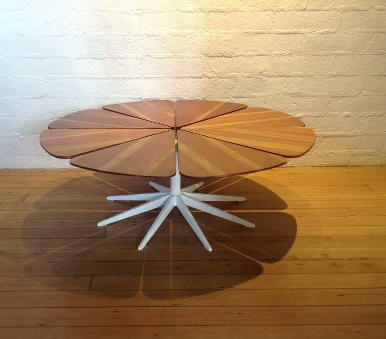 A Richard Schultz petal cocktail / coffee table
This table consists of eight pieces of wood, cut to look like a petal of a flower, attached to a white aluminum base.