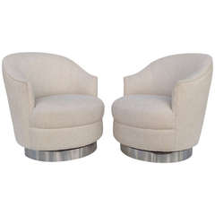 A pair of Karl Springer Swivel Chairs