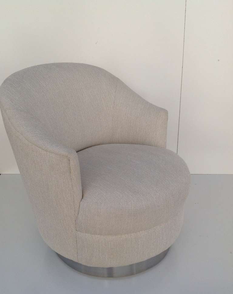 A pair of Karl Springer Swivel Chairs 1