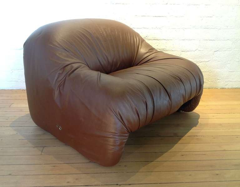 A rare leather over a plastic shell lounge chair 