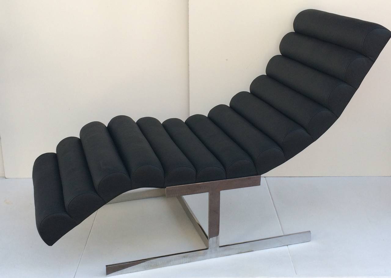 A gorgeous black leather channeled chaise lounge with solid polished chrome frame. 
Designed by Milo Baughman,
circa 1970s.