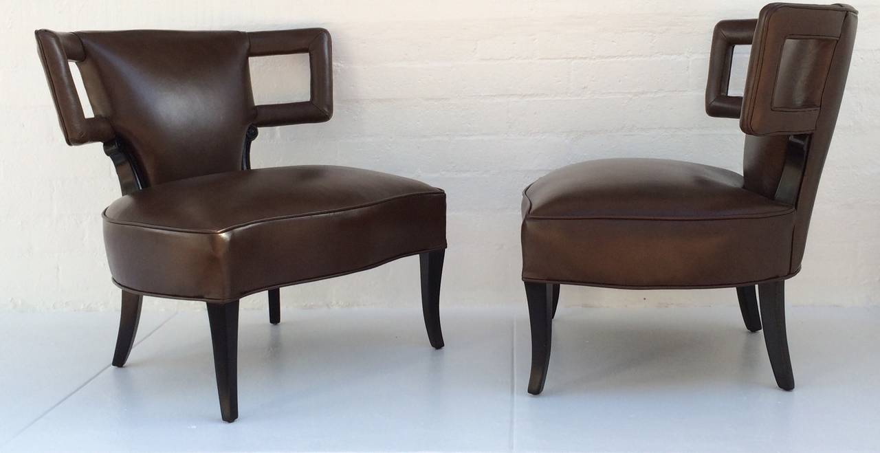 For you consideration, a pair of black lacquer and Leather side chairs by Grosfeld House. 
Circa 1960s
Newly re-lacquered in a gloss black and newly  reupholstered in a rich brown leather.