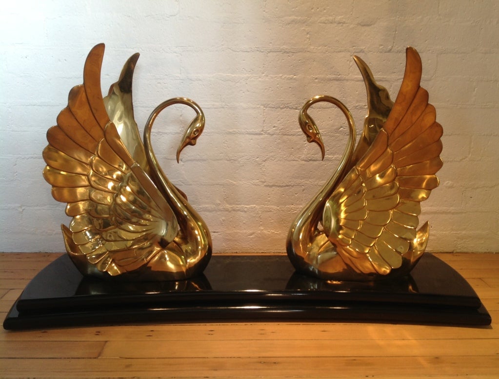 A spectacular Italian Brass Swans Console Table