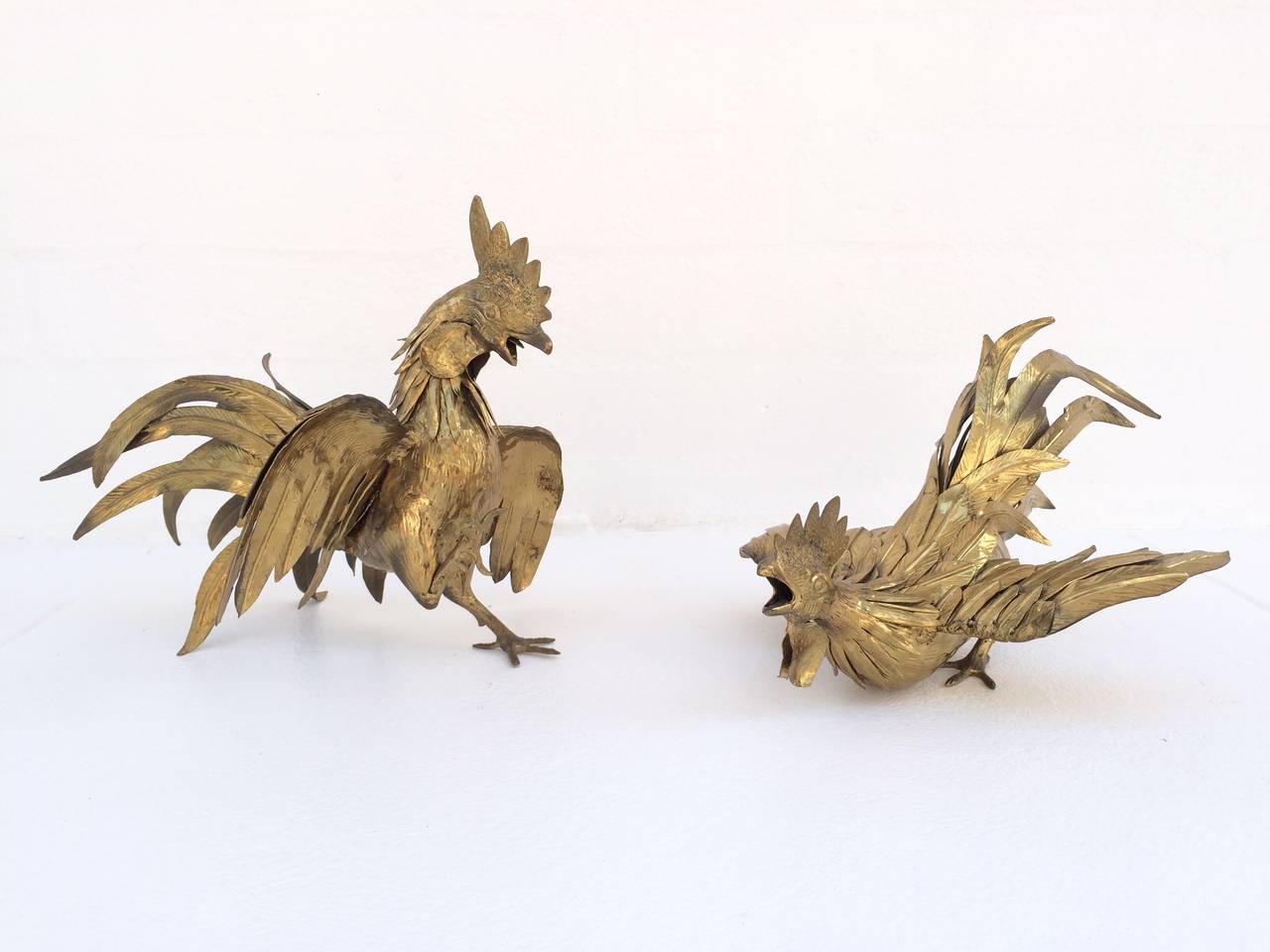 vintage brass fighting roosters