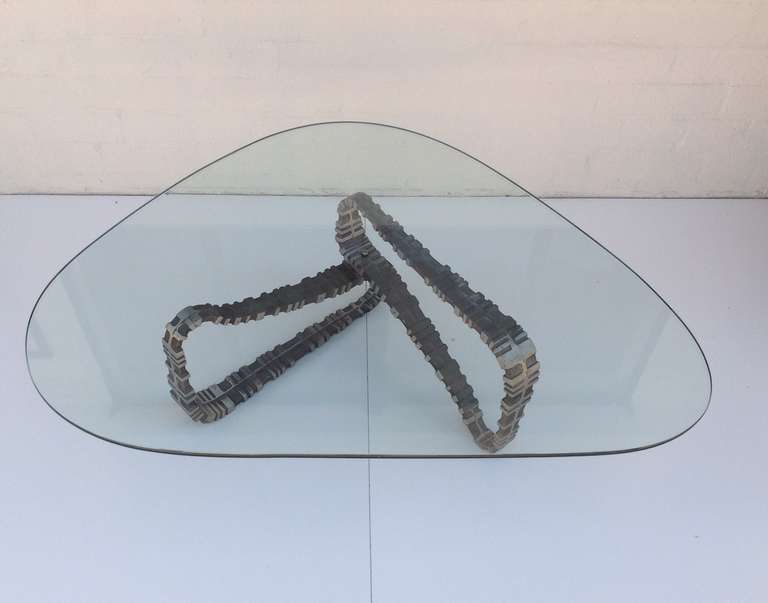 An aluminum base with a new 1/2 inch kidney shaped glass top coffee/cocktail table  circa 1970s