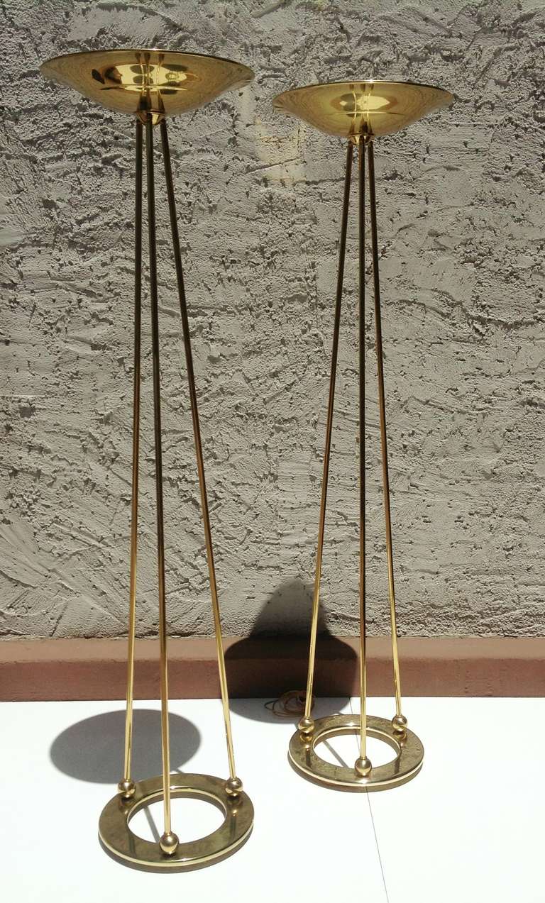 A pair of Polished  Brass Torchiere Floor Lamps by Casella