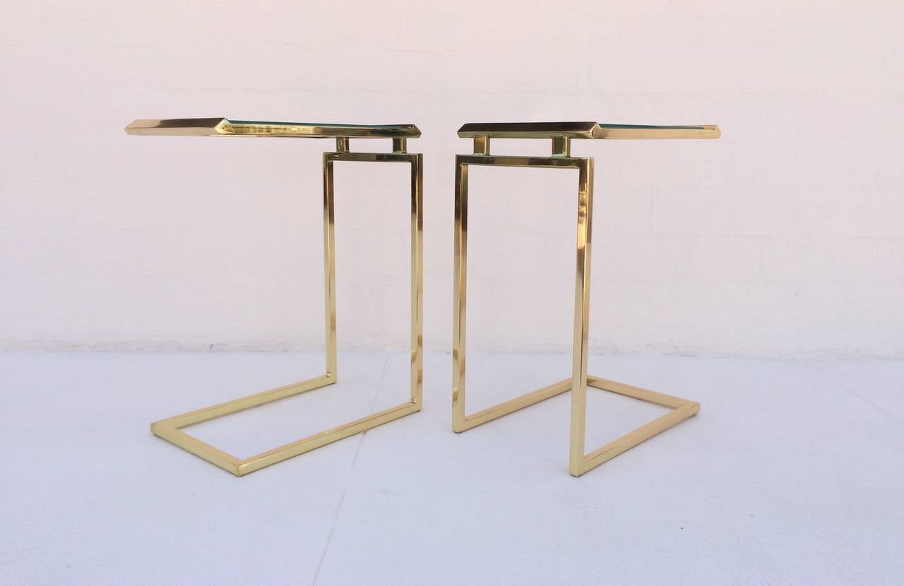 Beveled Pair of Polished Brass and Glass Side Tables Designed by Milo Baughman
