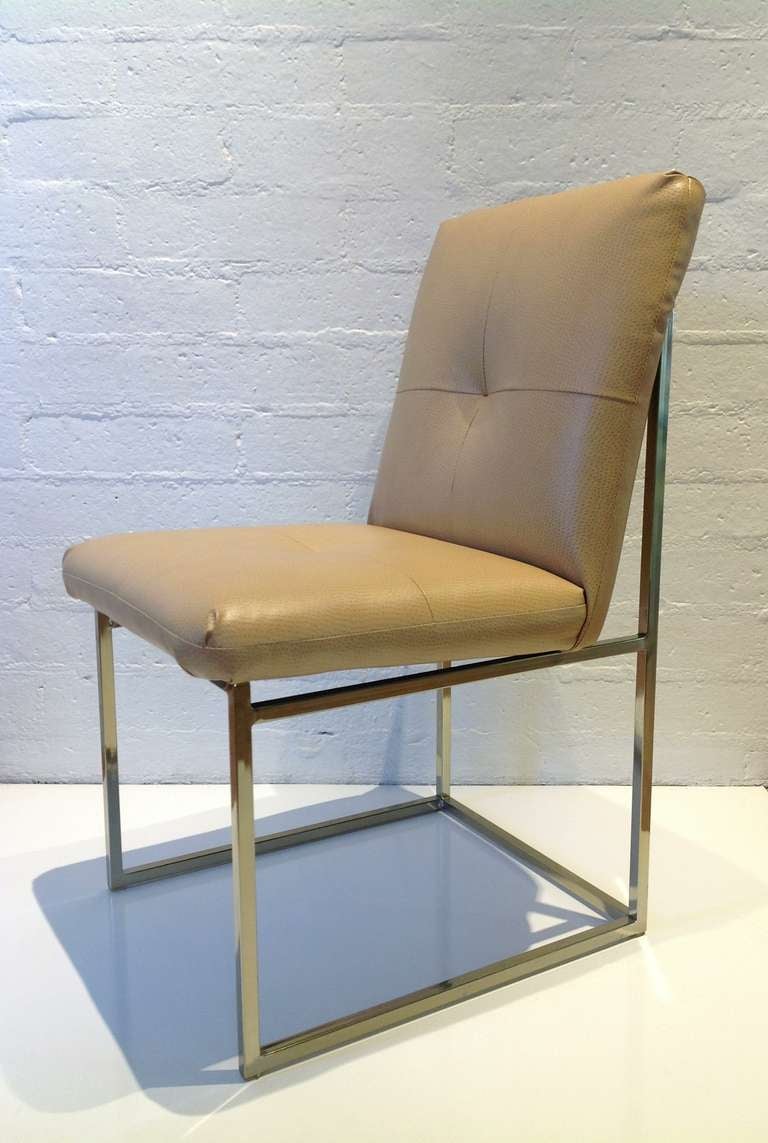 Set of six Milo Baughman dining chairs.
Brass base and newly reupholstered leather style fabric.