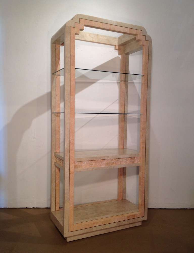 A wonderful display stand by Maitland-Smith from the 1980s 
Tessellated fossil stone with brass inlay.