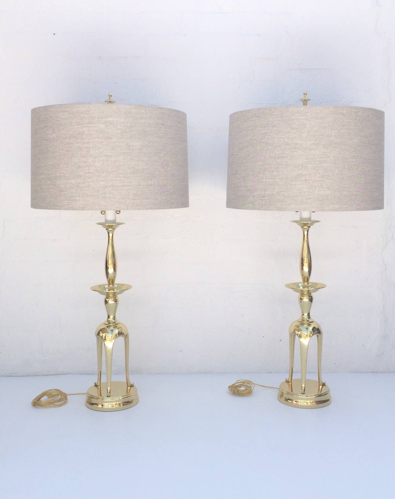 Mid-Century Modern Pair of Polished Brass Chapman Lamps in the Manner of James Mont For Sale