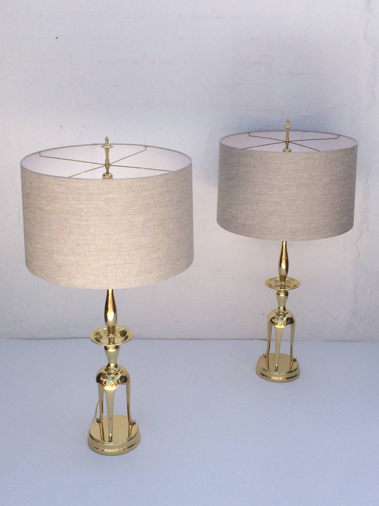 American Pair of Polished Brass Chapman Lamps in the Manner of James Mont For Sale