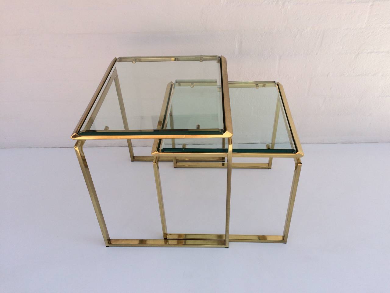 brass and glass nesting tables