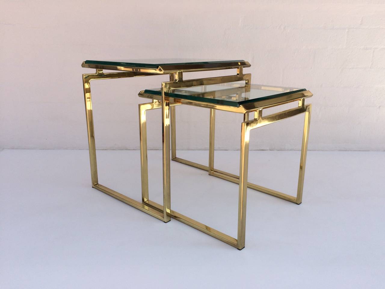 Mid-Century Modern Polished Brass and Beveled Glass Nesting Tables Designed by Milo Baughman