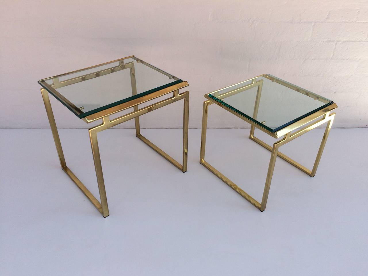 American Polished Brass and Beveled Glass Nesting Tables Designed by Milo Baughman