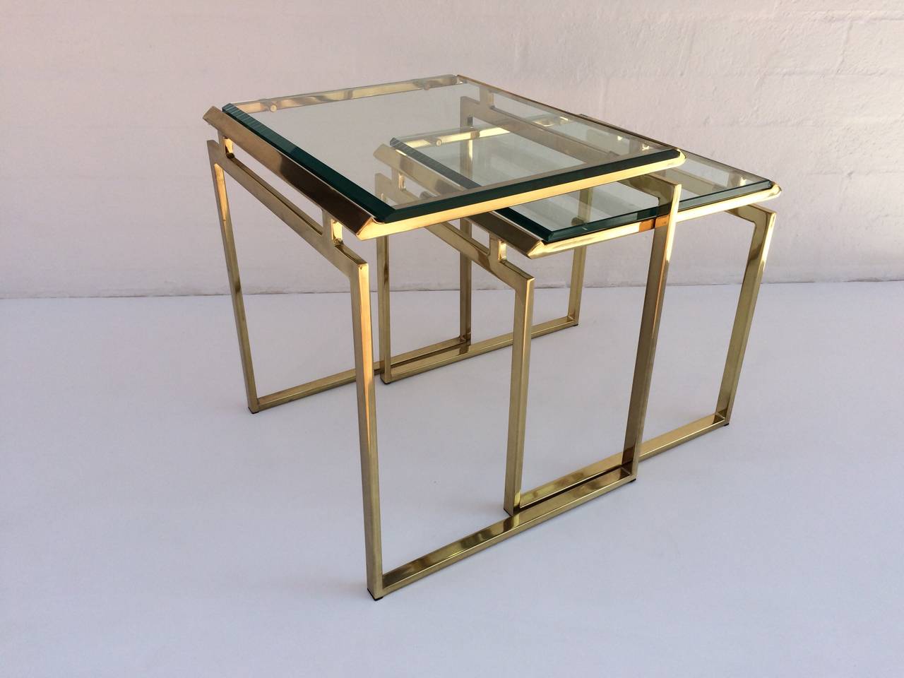 Polished Brass and Beveled Glass Nesting Tables Designed by Milo Baughman In Excellent Condition In Palm Springs, CA