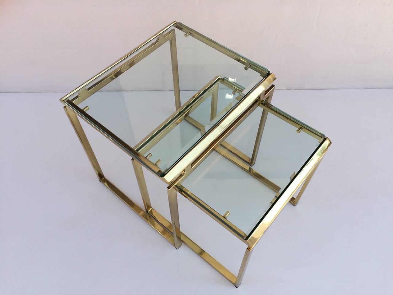 Late 20th Century Polished Brass and Beveled Glass Nesting Tables Designed by Milo Baughman