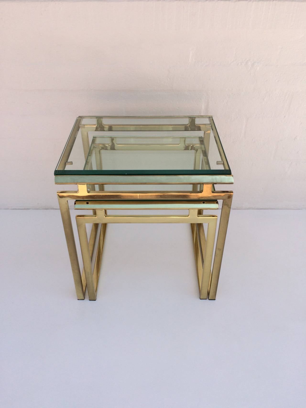 Polished Brass and Beveled Glass Nesting Tables Designed by Milo Baughman 1