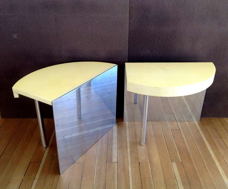 These rare side table/night stands are goatskin with polished aluminum back and leg. 
Designed by Karl Springer