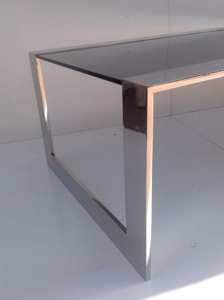 Late 20th Century Smoked Glass and Polished Stainless Steel Coffee/Cocktail Table by Brueton For Sale