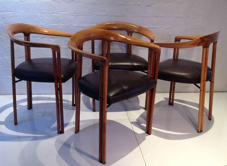 Set of four chairs by Franco Poli for Bernini.
Constructed from olive wood with a wonderful grain and dark brown Leather seat.