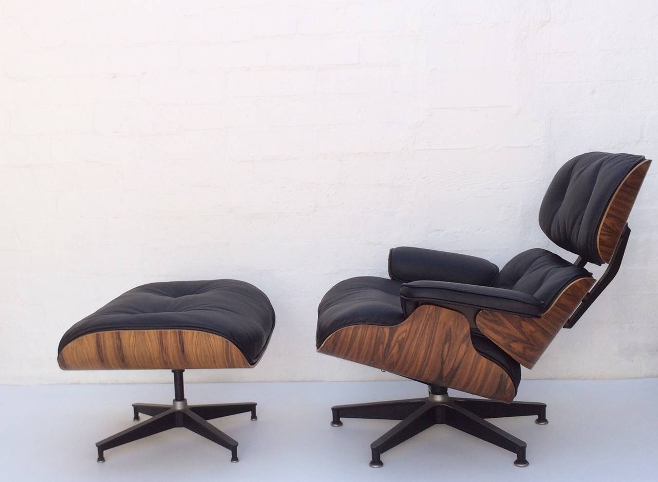 Mid-Century Modern Pair of Early Eames Rosewood 670 & 671 Lounges Chairs with Ottomans