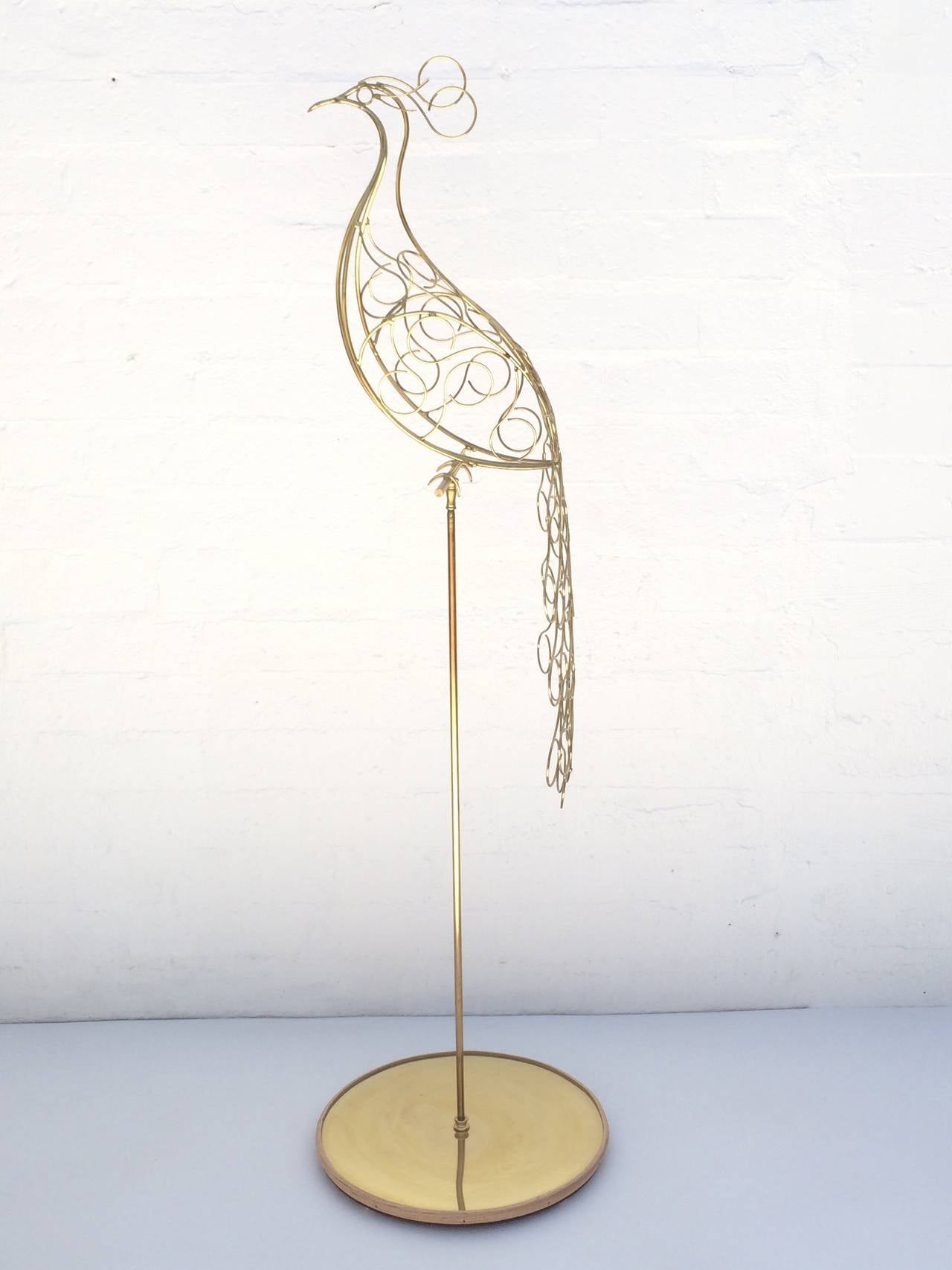 A stunnig freestanding brass peacock sculpture by Curtis Jere from the 1970s.