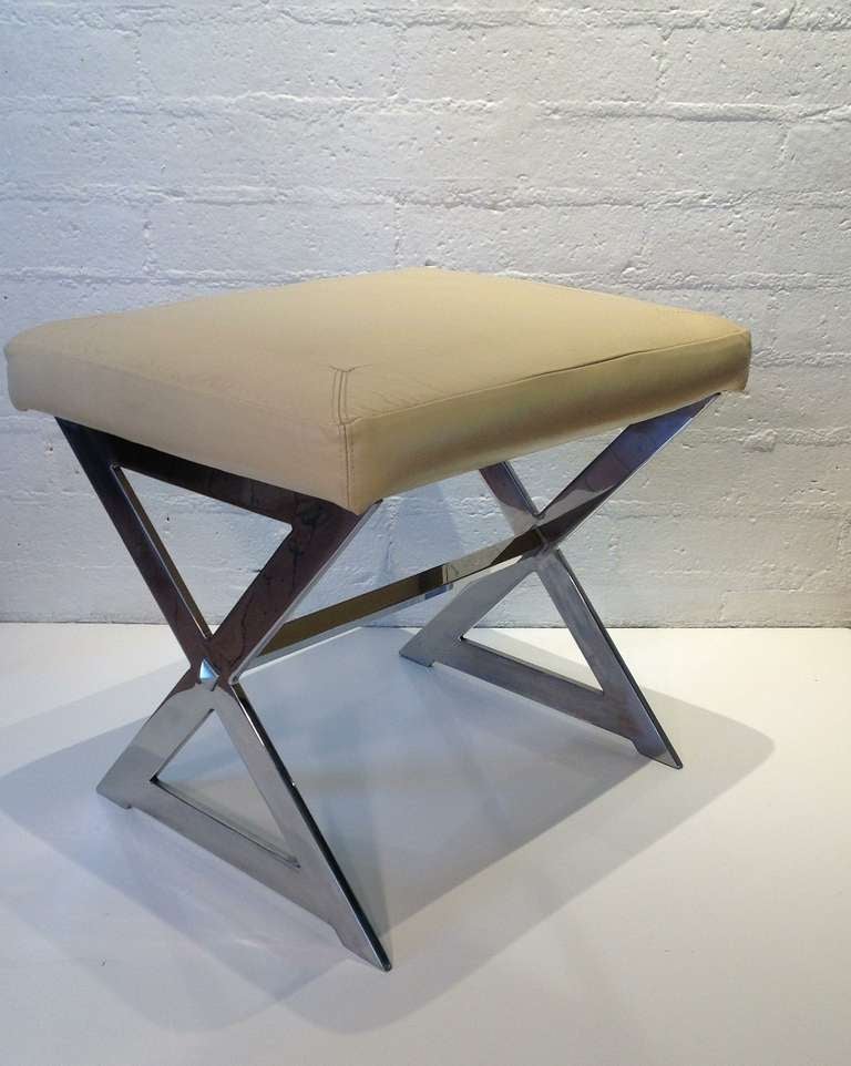 Chrome base stool with a soft cream color leather seat.
This stool designed by Milo Baughman is very well made with a heavy base.