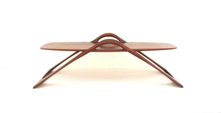 A gorgeous sculptural walnut coffee or cocktail table.<br />
Circa 1960s<br />
This table is very well made and may have been a custom piece.