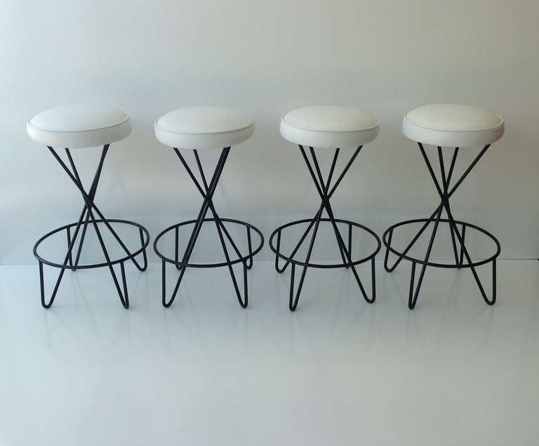 Mid-Century Modern Set of four Bar Stools designed by Paul Tuttle