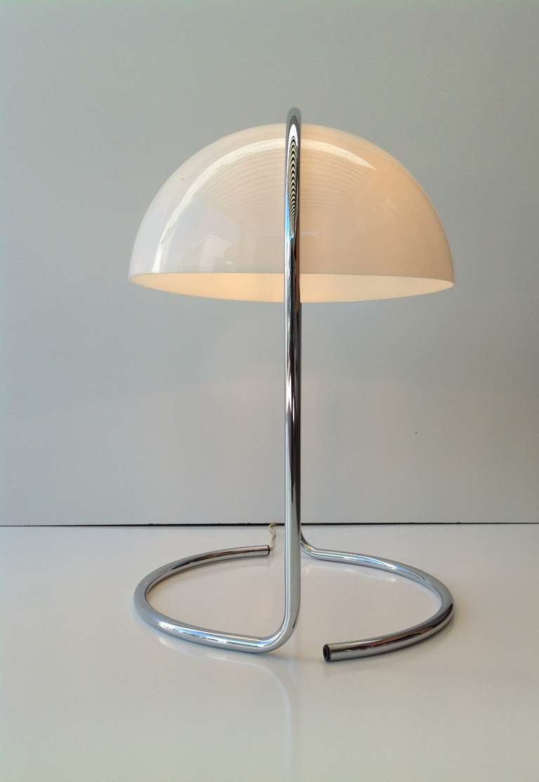 A 1960s white acrylic shade lamp with a chrome base designed by Walter Von Nessen.
Newly rewired.