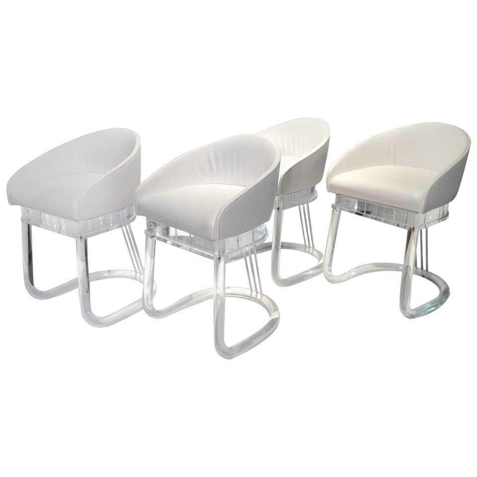 Set of four Lion in Frost Acrylic Dining Chairs