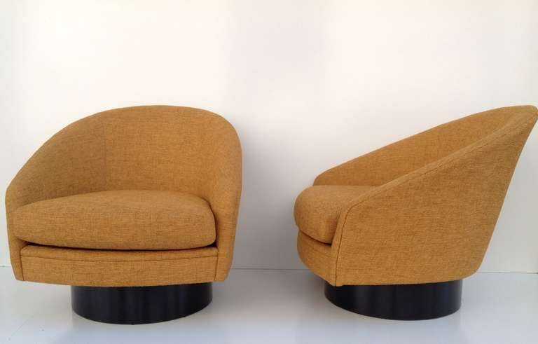 Mid-Century Modern A Pair of Swivel Lounge Chairs by Adrian Pearsall