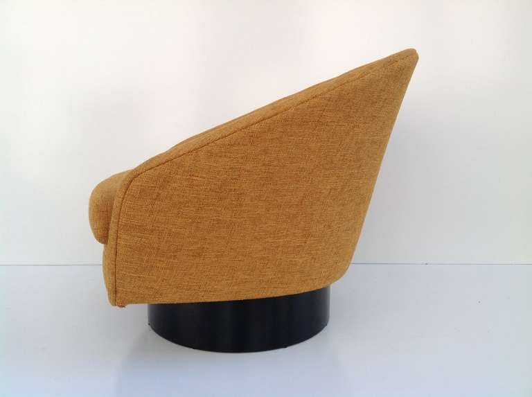 Fabric A Pair of Swivel Lounge Chairs by Adrian Pearsall