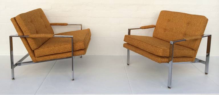 A pair of polished chrome newly reupholstered in a burnt orange tweed fabric lounge chairs designed by Milo Baughman for Thayer Coggin, 
circa 1970s.