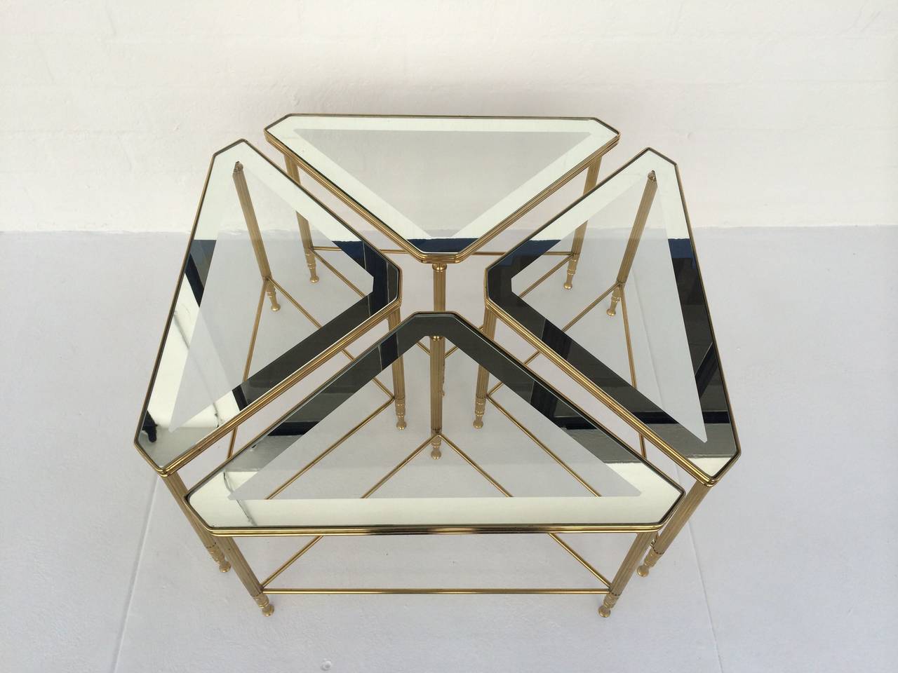 Mid-20th Century Set of Four Brass and Glass Tables by Maison Jansen