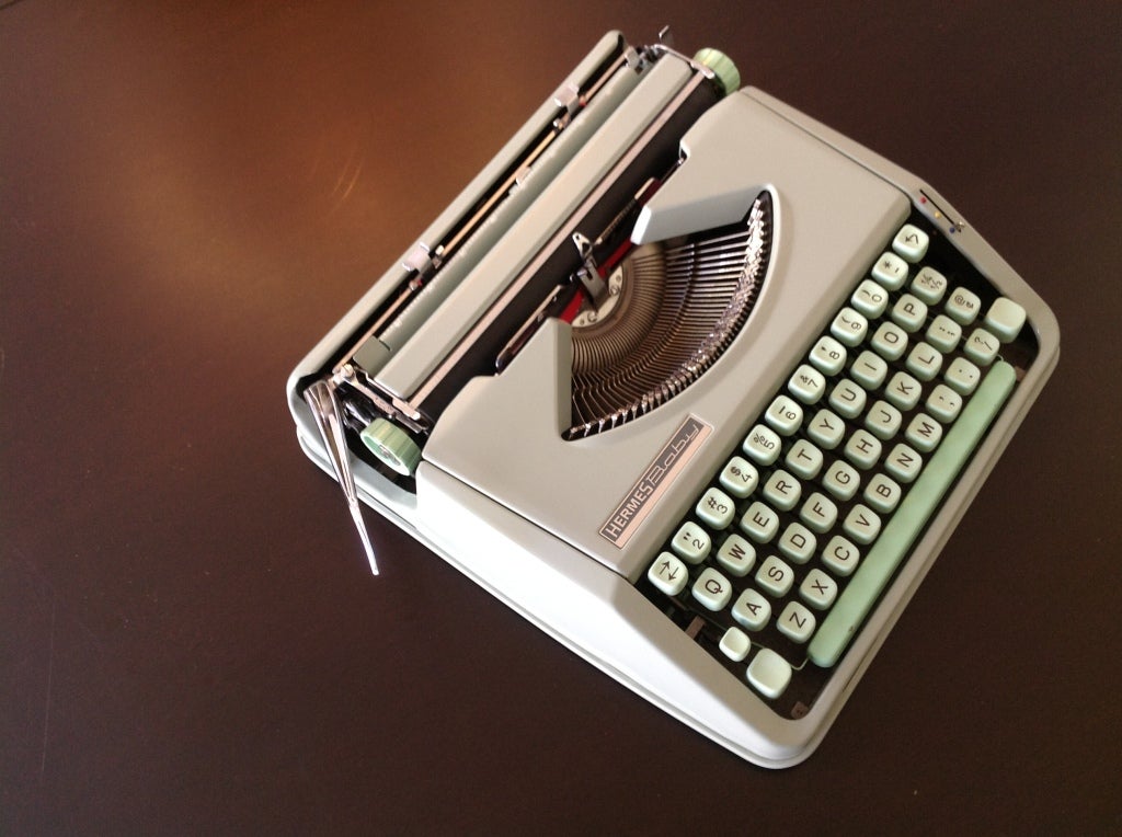 A Hermes Baby typewriter in perfect working order. C. 1950's.
The color is a blue/light green.