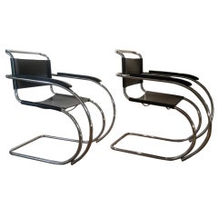 A pair of MR lounge chairs by Ludwig Mies van der Rohe