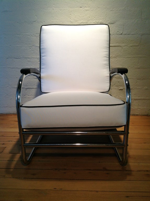 A wonderful example of a streamline Art Deco tubular metal lounge chair by American designer Kem Weber.  This 1930's chair is in excellent condition with new fabric on the cushions and the original chrome plating on the metal.  The chair has a