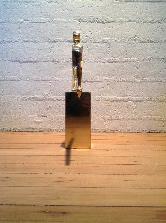 A brass Sculpture of a Gymnast by Dolbi Cashier.