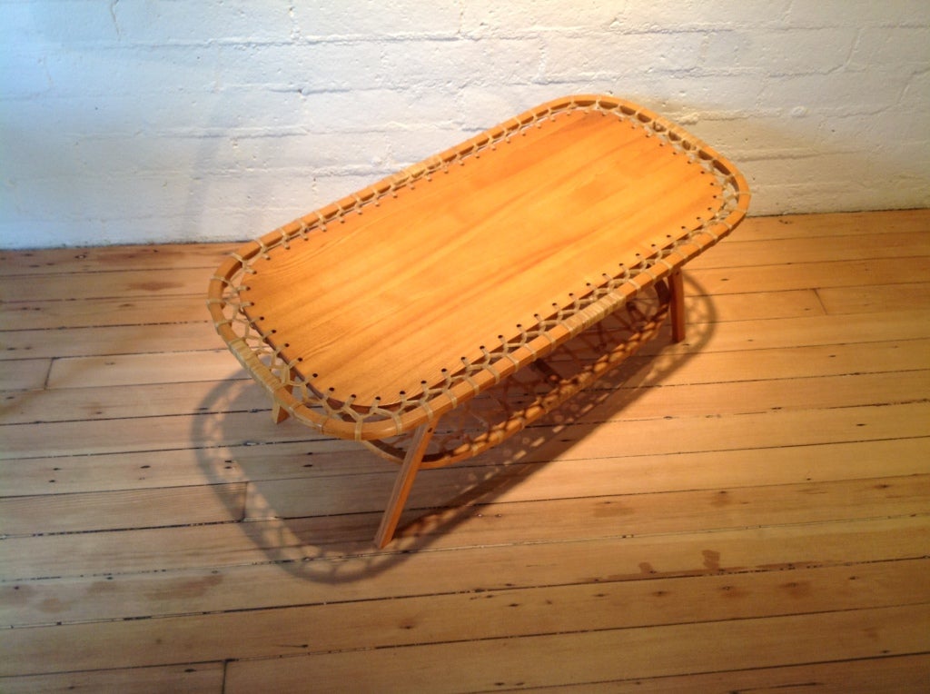 American
1970s
Bent/steamed oak coffee table with rawhide snow shoe-inspired design made by snow shoe manufacturer Snocraft